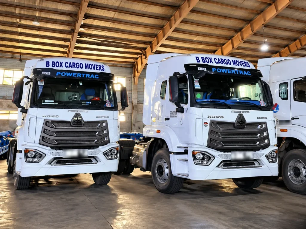 B BOX Cargo Movers trucks parked in the warehouse
